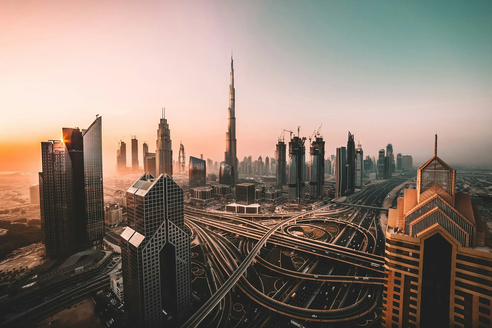 Dubai skyline at dusk featuring the Burj Khalifa